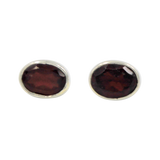 Sundari sterling silver stud earrings with a faceted oval shape gemstone