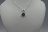 Round Sterling Silver Pendent with a Cbuchone gemstone