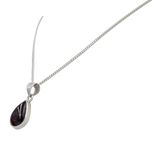 A Stunning large teardrop cabochon gemstone pendant set on a deep bezel setting