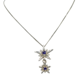 Sterling Silver Twain Sunray Pendant with a faceted gemstone