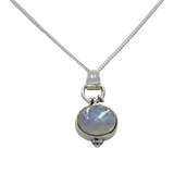 Oval Shaped simple but elegant pendant with a cabochon stone