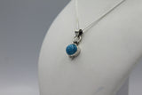 Oval Shaped simple but elegant pendant with a cabochon stone