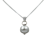 Oval Shaped simple but elegant pendant with a cabochon stone
