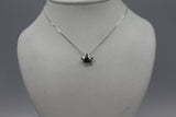 Pendant with a Diamond, Green Emerald or a Ruby stone