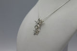Sterling Silver Twain Sunray Pendant with a faceted gemstone