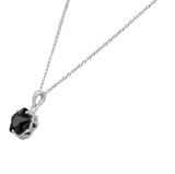 Star shape pendant with a faceted colored Zirconia
