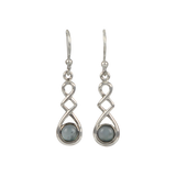 A swirly, unique and elegant pair of sterling silver earrings, carrying a range of gems