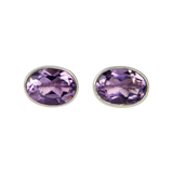 Sundari sterling silver stud earrings with a faceted oval shape gemstone