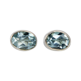 Sundari sterling silver stud earrings with a faceted oval shape gemstone