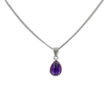 Delicate small teardrop cabochon gemstone pendant set in a thin bezel setting