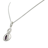 Double Infinity Pendant with a facted gemstone