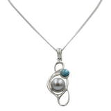 Large Pearl Swirly Pendant with an accent gemstone