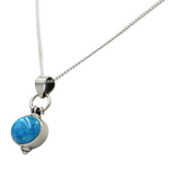 Oval Shaped simple but elegant pendant with a cabochon stone
