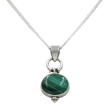 Oval Shaped simple but elegant pendant with a cabochon stone