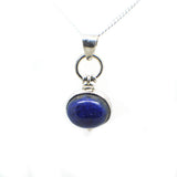 Oval Shaped simple but elegant pendant with a cabochon stone